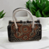 Vintage Handbag with Full-Figure Embossed Design